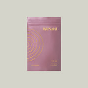 WeNatal For Her (One Time) supplement pouch, containing 90 capsules, designed for women. Featured on a pink bag with gold circles, emphasizing prenatal care.